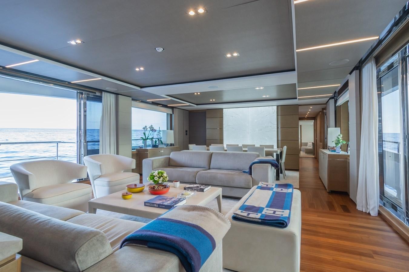 a living room with a large window aboard MINOR FAMILY AFFAIR Yacht for Sale