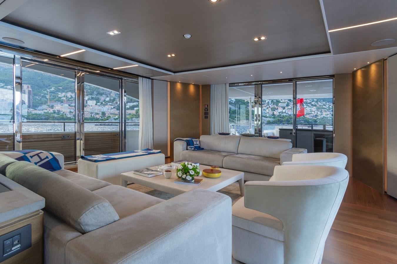 a living room with a large window aboard MINOR FAMILY AFFAIR Yacht for Sale