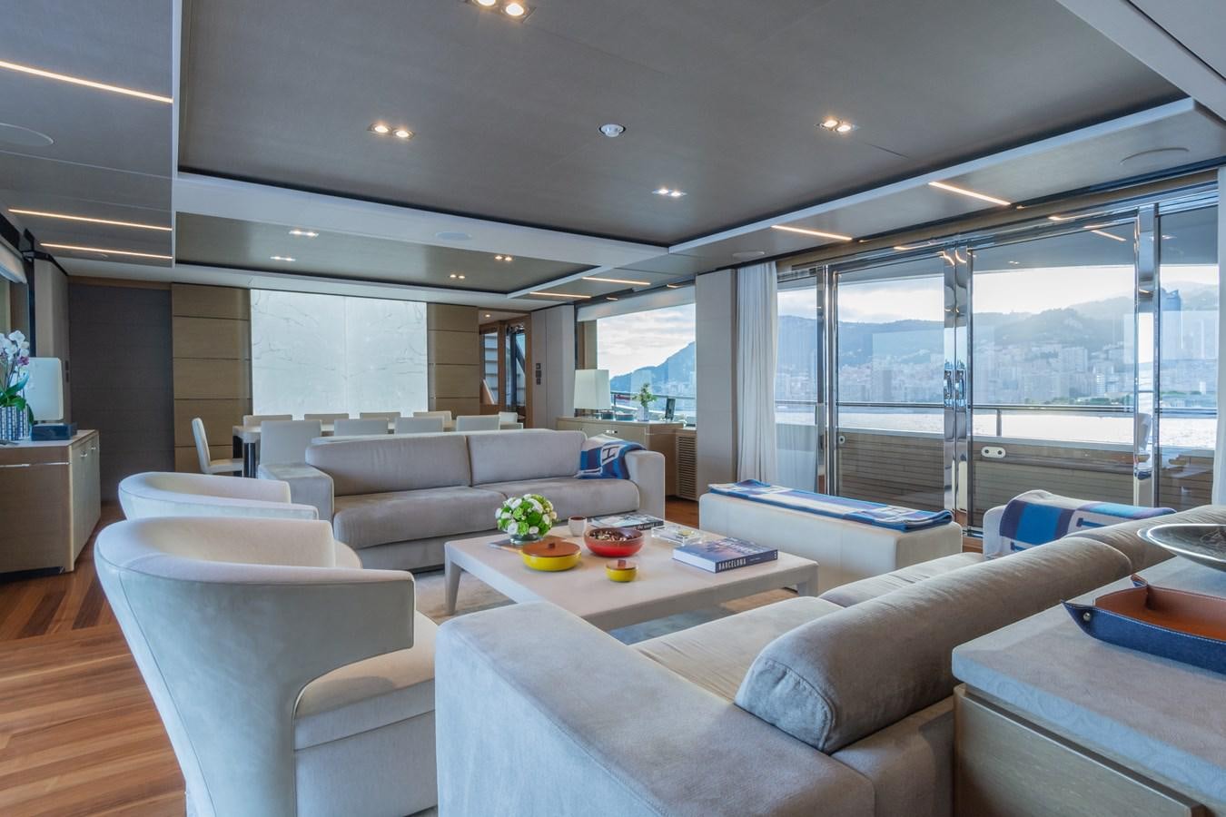 a living room with a large glass window aboard MINOR FAMILY AFFAIR Yacht for Sale