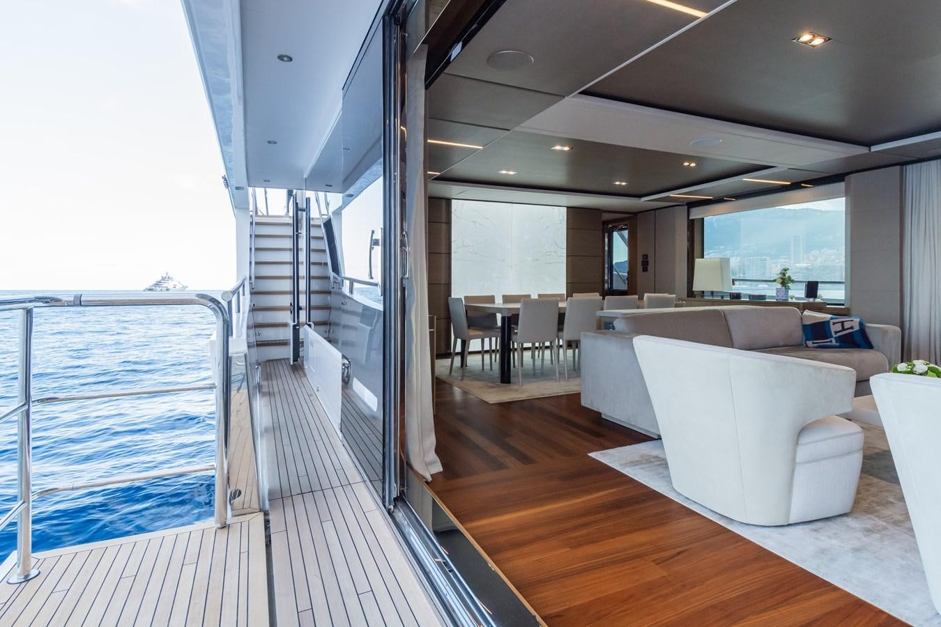 a room with a large balcony aboard MINOR FAMILY AFFAIR Yacht for Sale