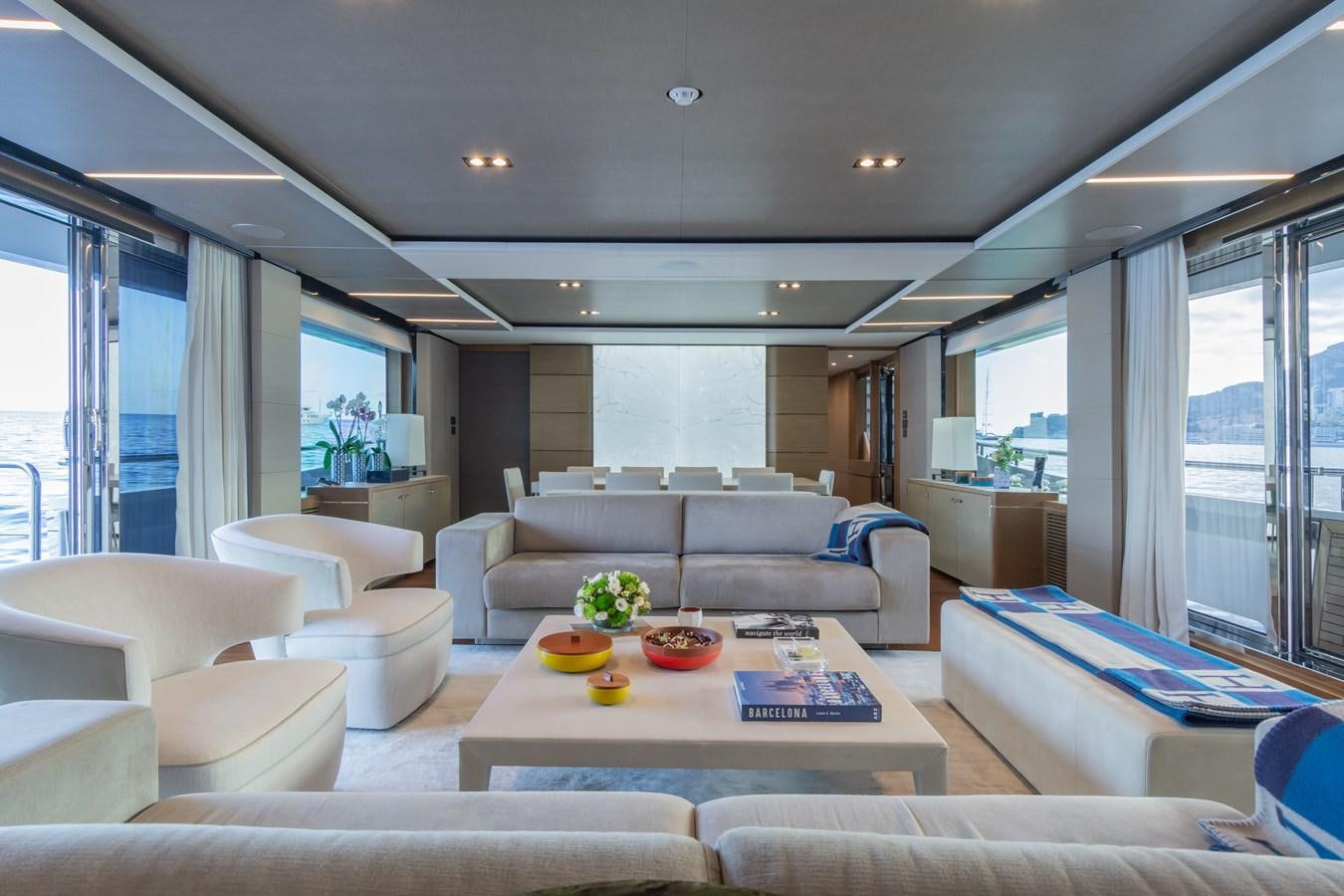 a living room with a large window aboard MINOR FAMILY AFFAIR Yacht for Sale