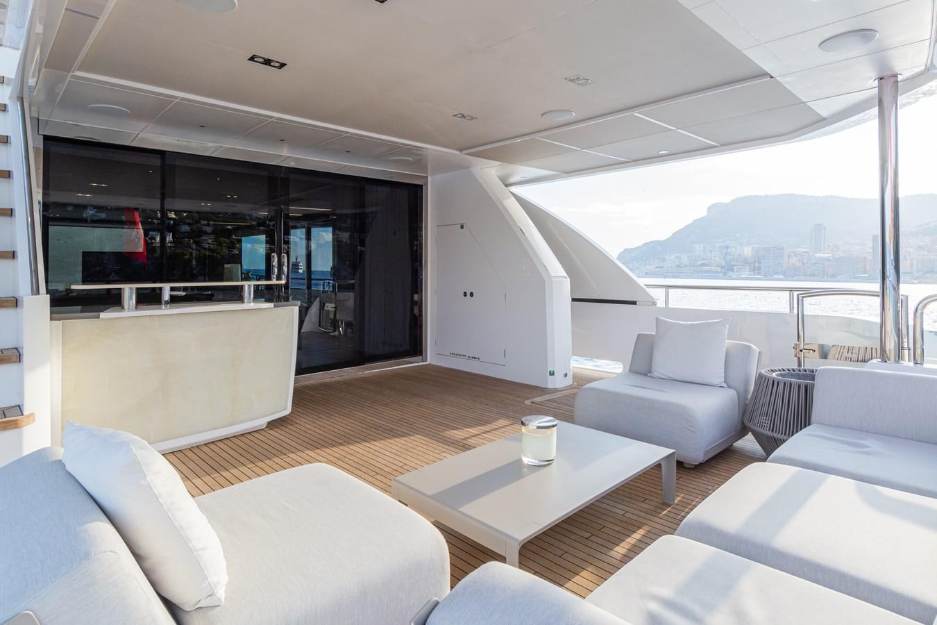 a living room with a large window aboard MINOR FAMILY AFFAIR Yacht for Sale