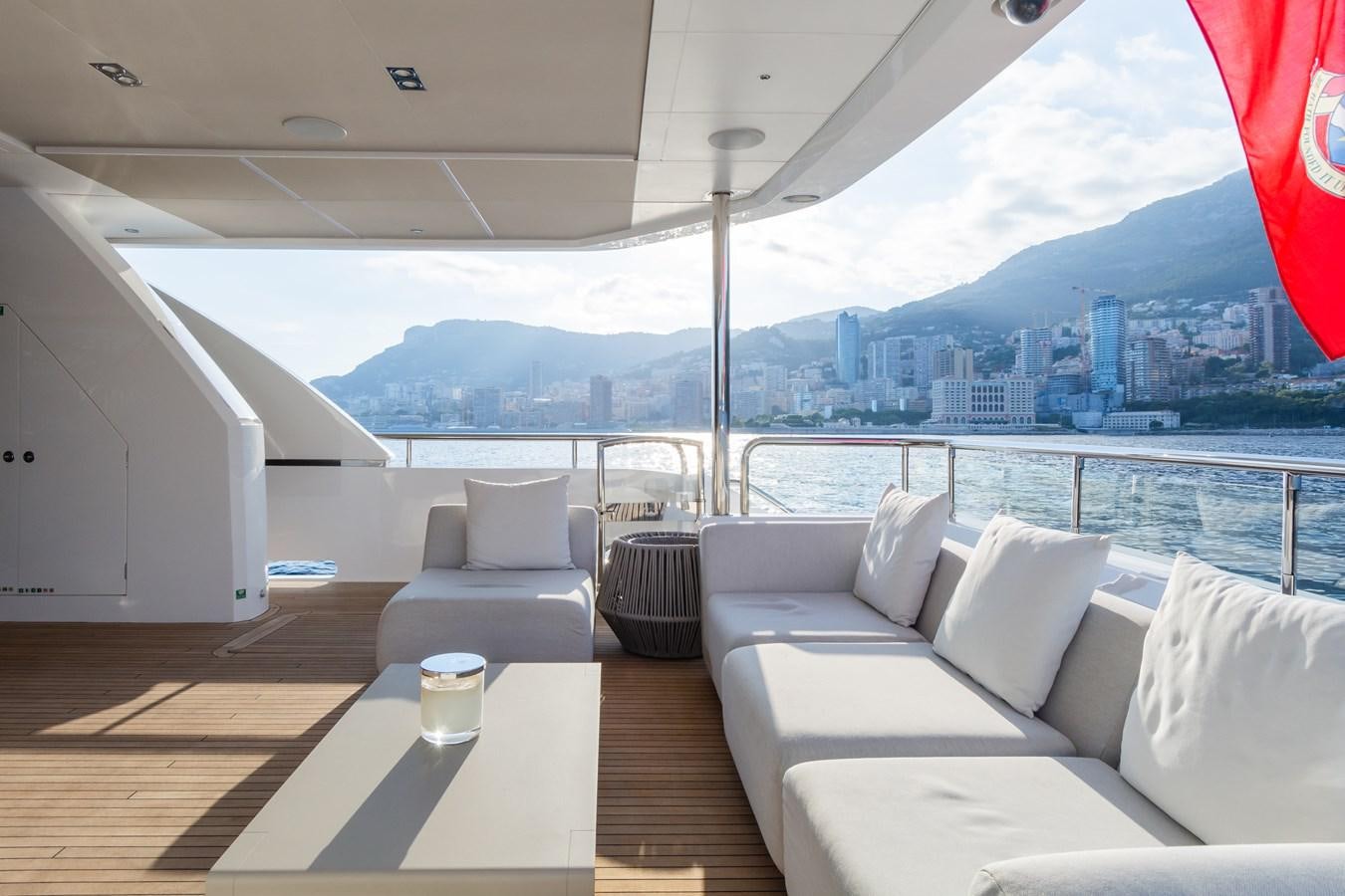 a room with a view of a city and a body of water aboard MINOR FAMILY AFFAIR Yacht for Sale