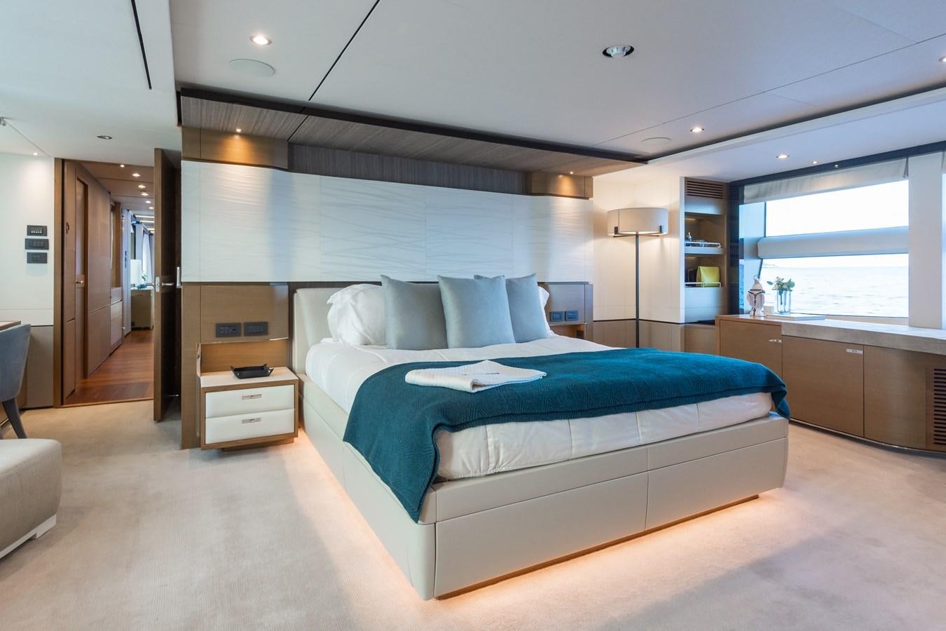 a large bedroom with a large bed aboard MINOR FAMILY AFFAIR Yacht for Sale