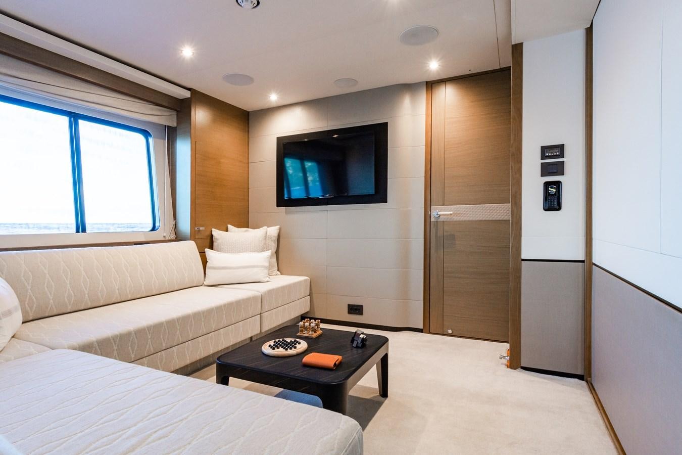 a room with a bed and a tv aboard MINOR FAMILY AFFAIR Yacht for Sale