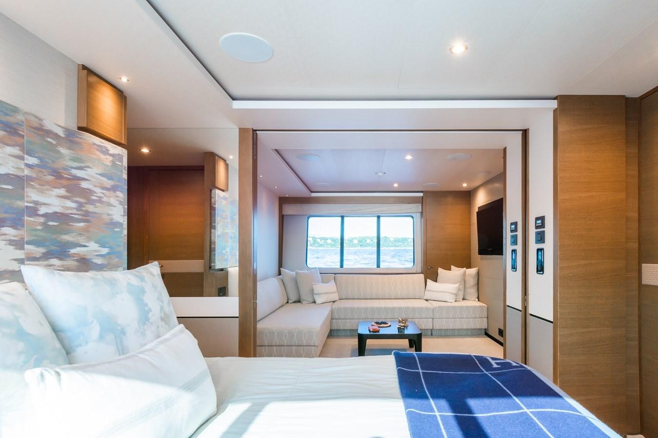 a room with a bed and a table aboard MINOR FAMILY AFFAIR Yacht for Sale