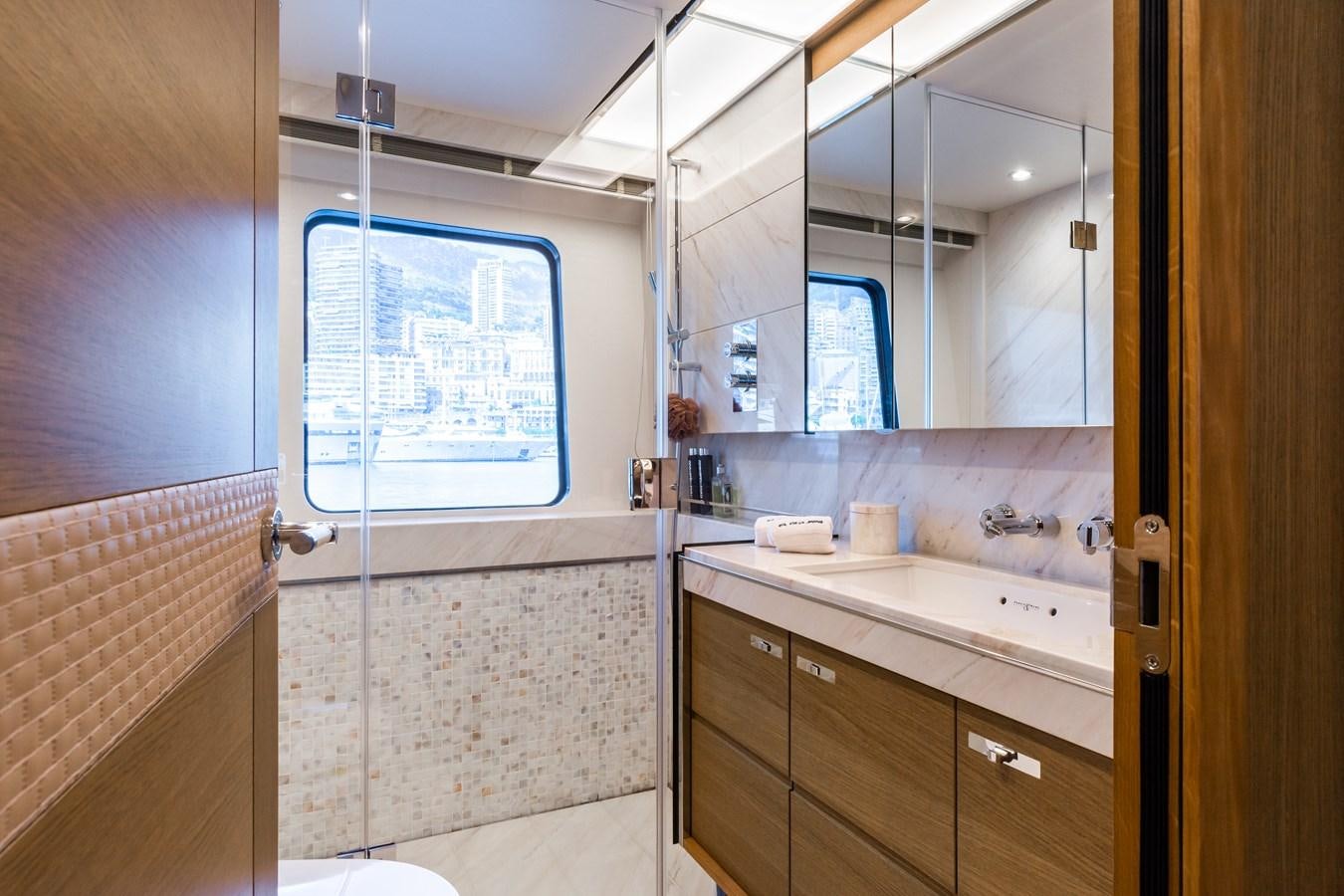 a bathroom with a sink and a mirror aboard MINOR FAMILY AFFAIR Yacht for Sale