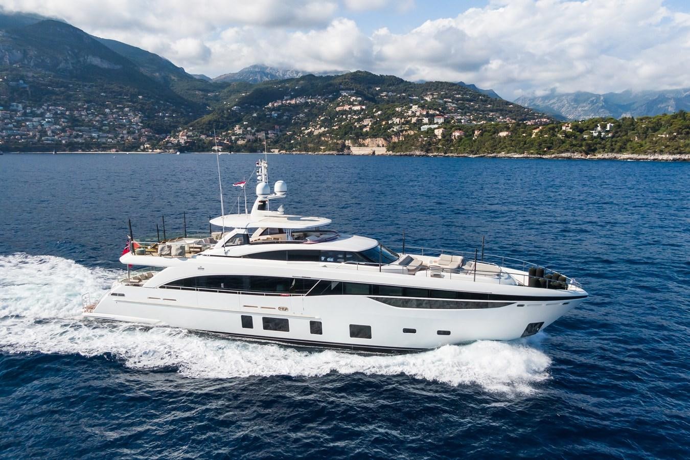 a white yacht on the water aboard MINOR FAMILY AFFAIR Yacht for Sale