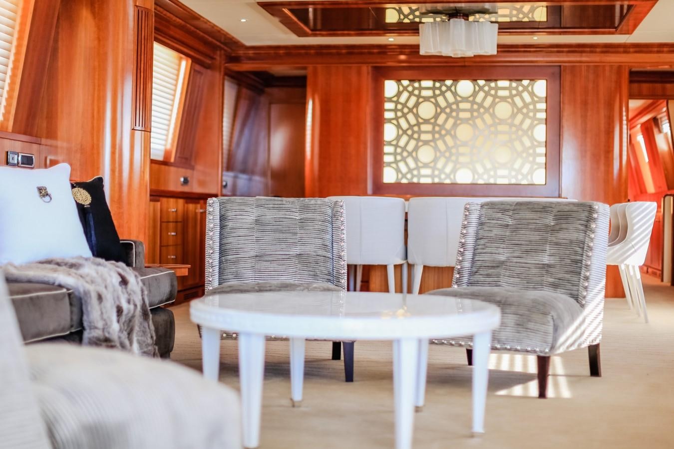 a room with chairs and a table aboard HUNTER Yacht for Sale