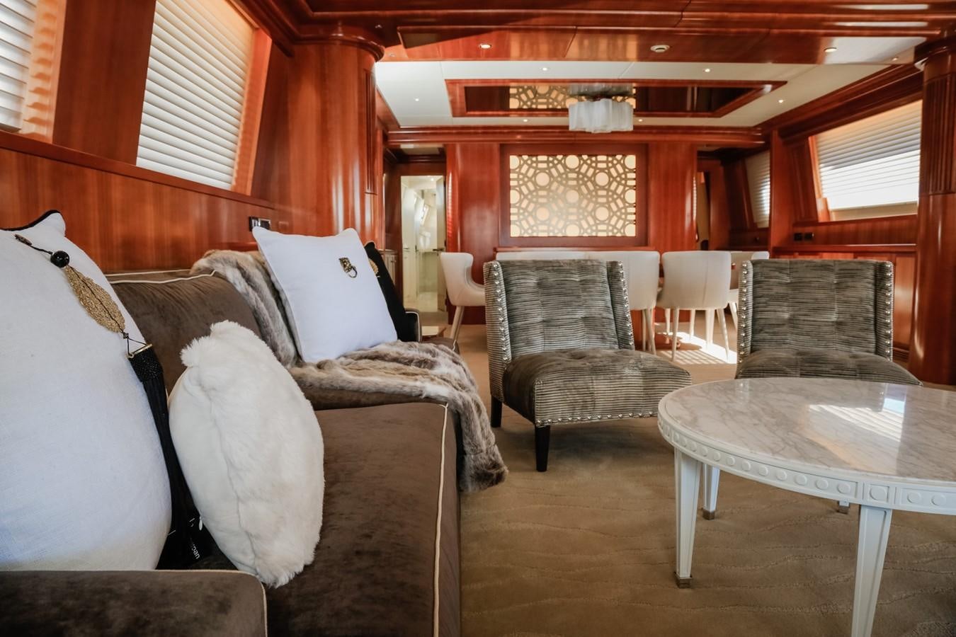 a room with a table and chairs aboard HUNTER Yacht for Sale