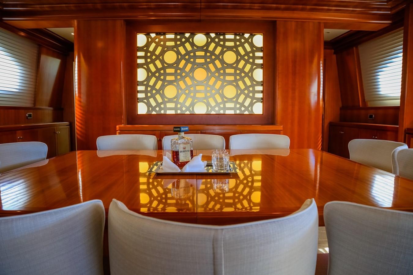 a room with a table and chairs aboard HUNTER Yacht for Sale