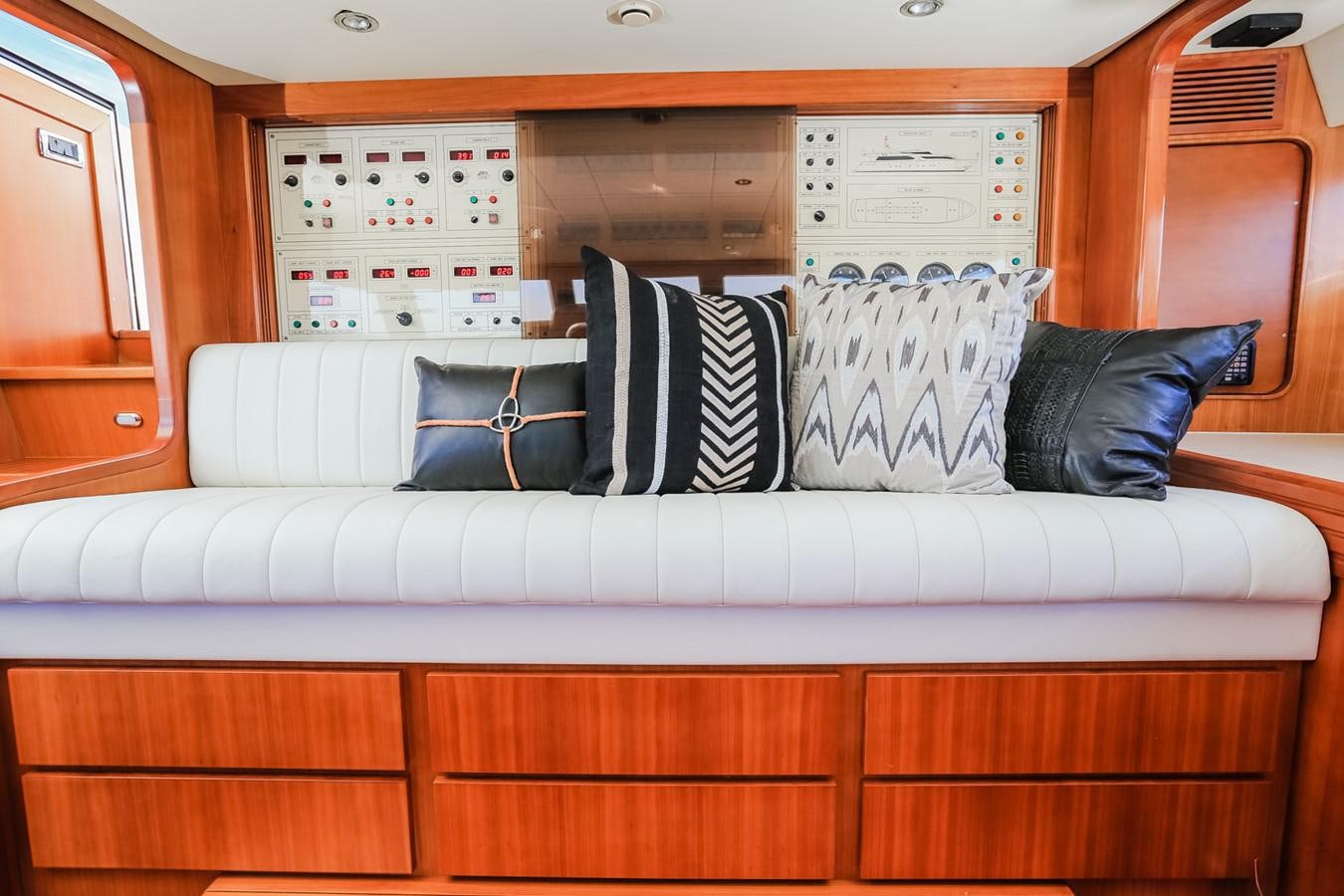 a couch with pillows aboard HUNTER Yacht for Sale