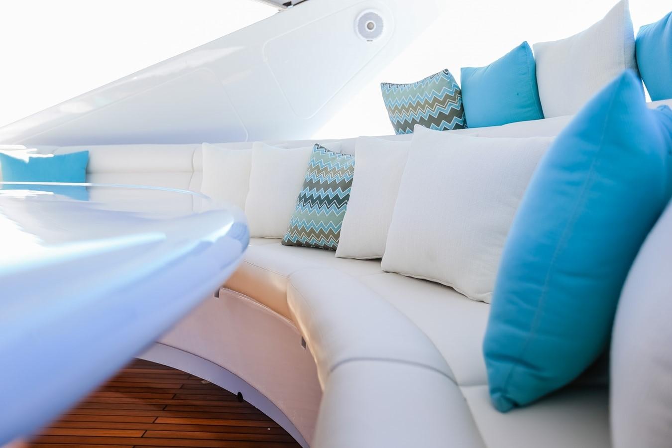 a white couch with pillows aboard HUNTER Yacht for Sale