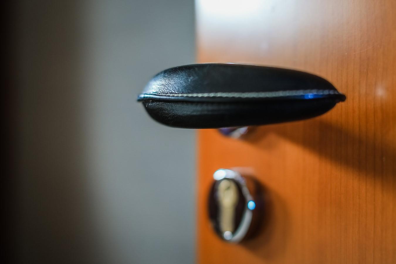 a black object on a wooden surface aboard HUNTER Yacht for Sale