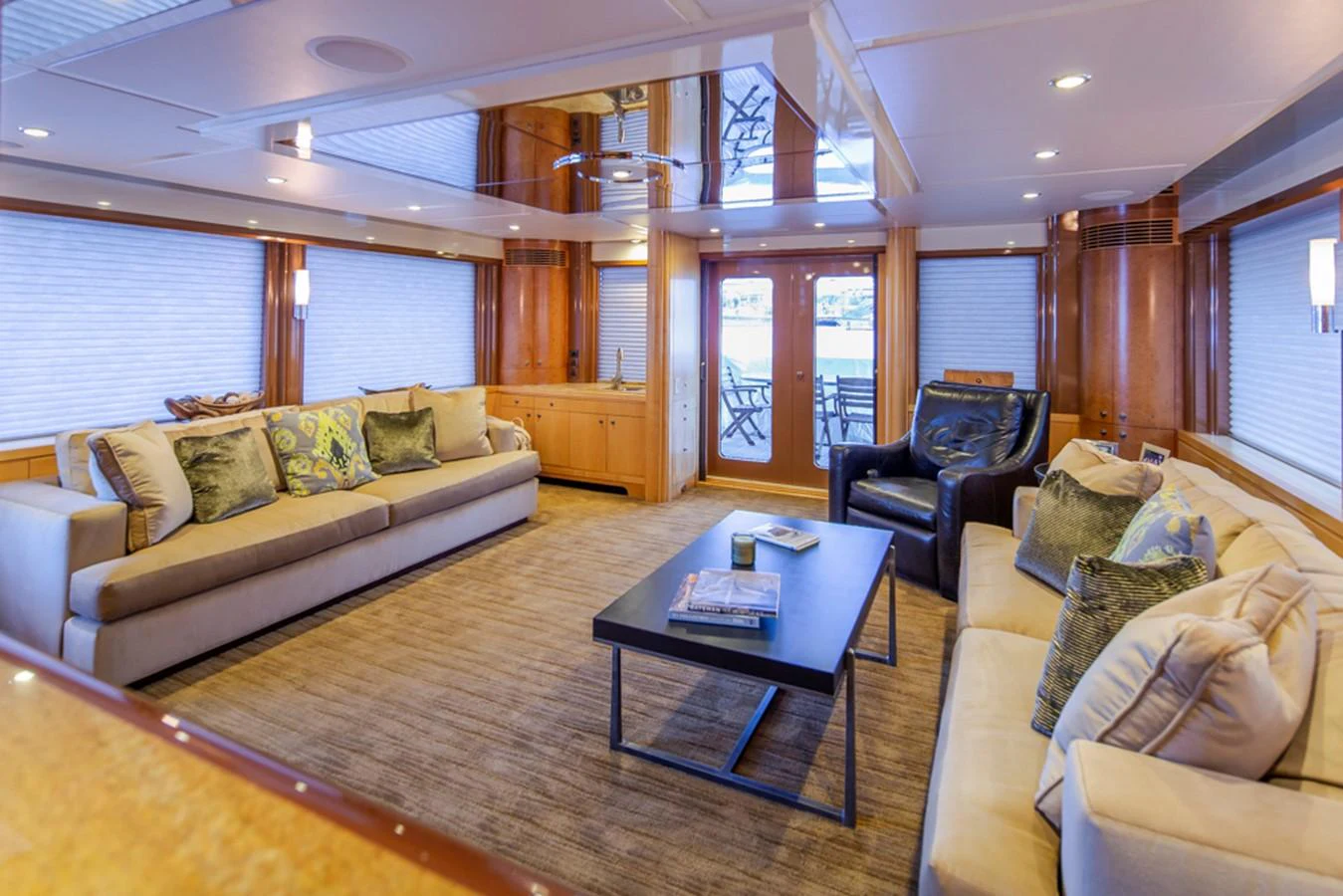 a living room with a couch and a coffee table aboard C JEWEL Yacht for Sale