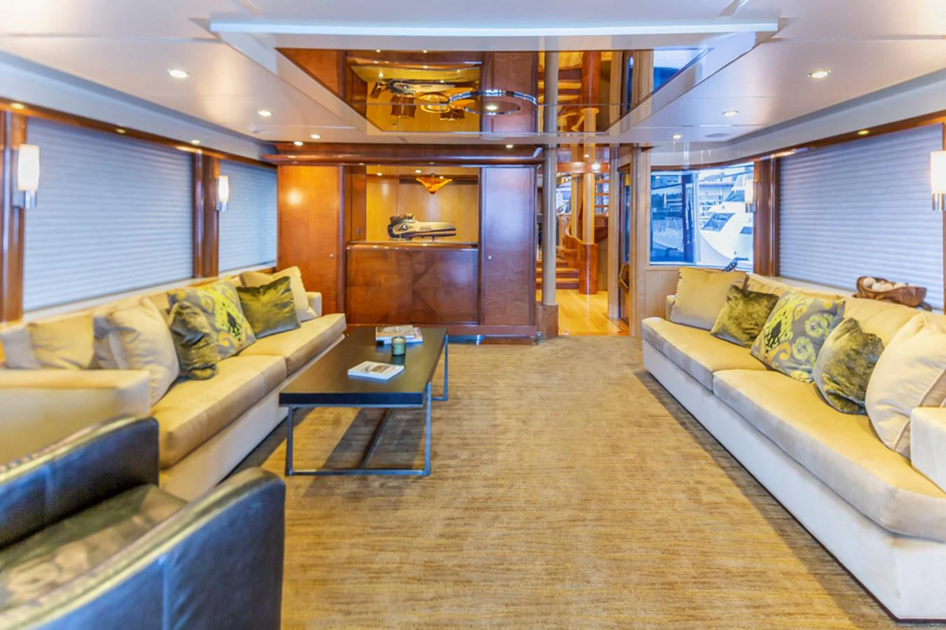 a living room with a couch and a table aboard C JEWEL Yacht for Sale