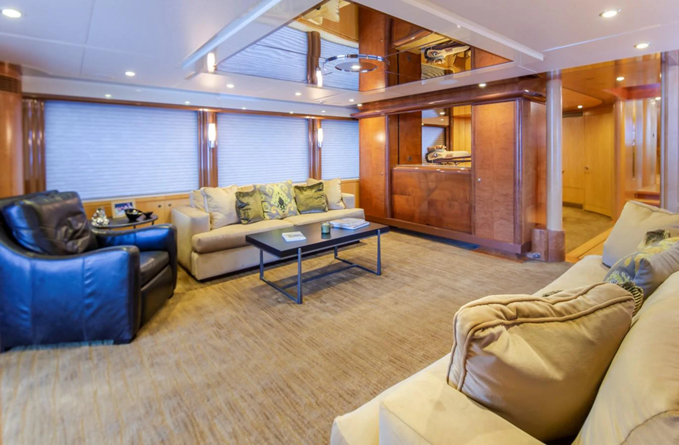 a living room with a couch and a coffee table aboard C JEWEL Yacht for Sale
