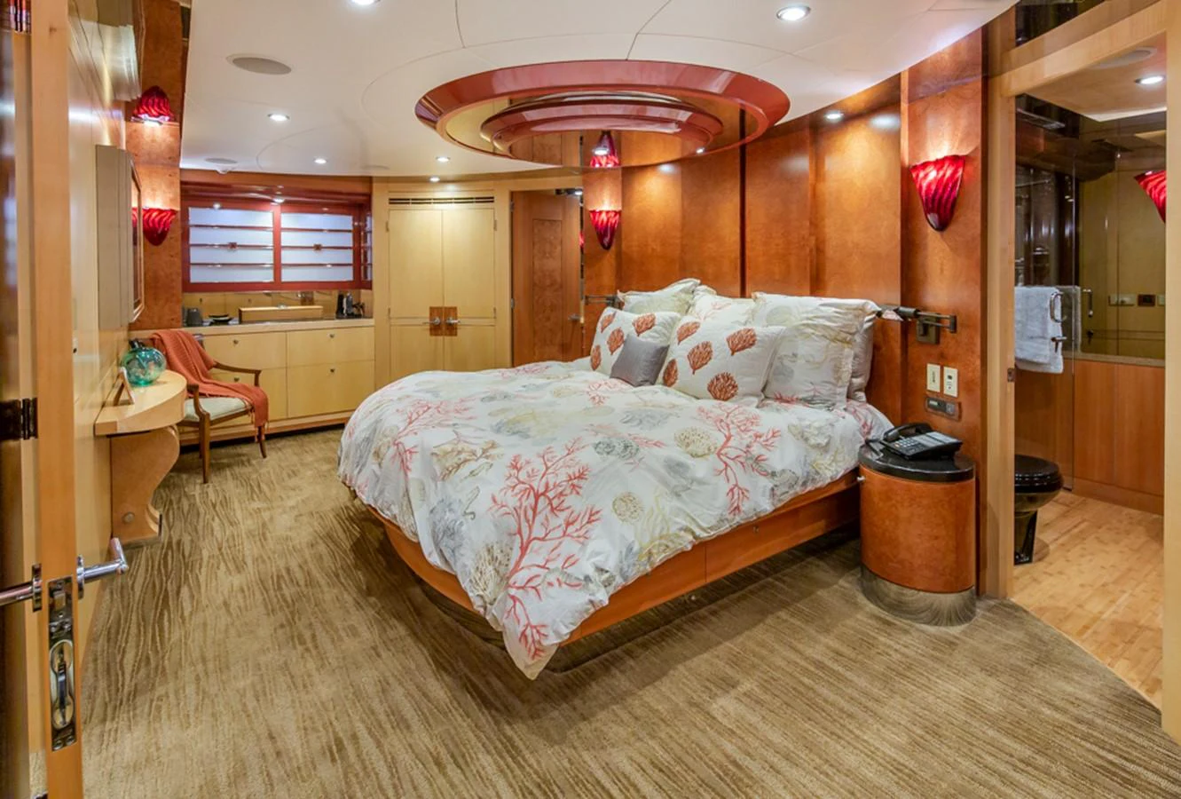 a bed in a room aboard C JEWEL Yacht for Sale