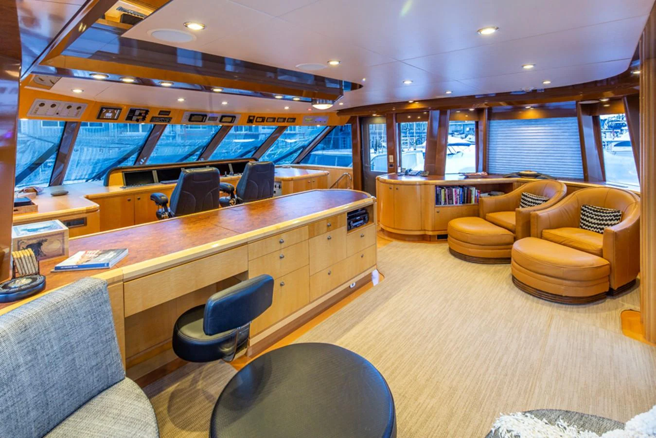 a room with a large table and chairs aboard C JEWEL Yacht for Sale