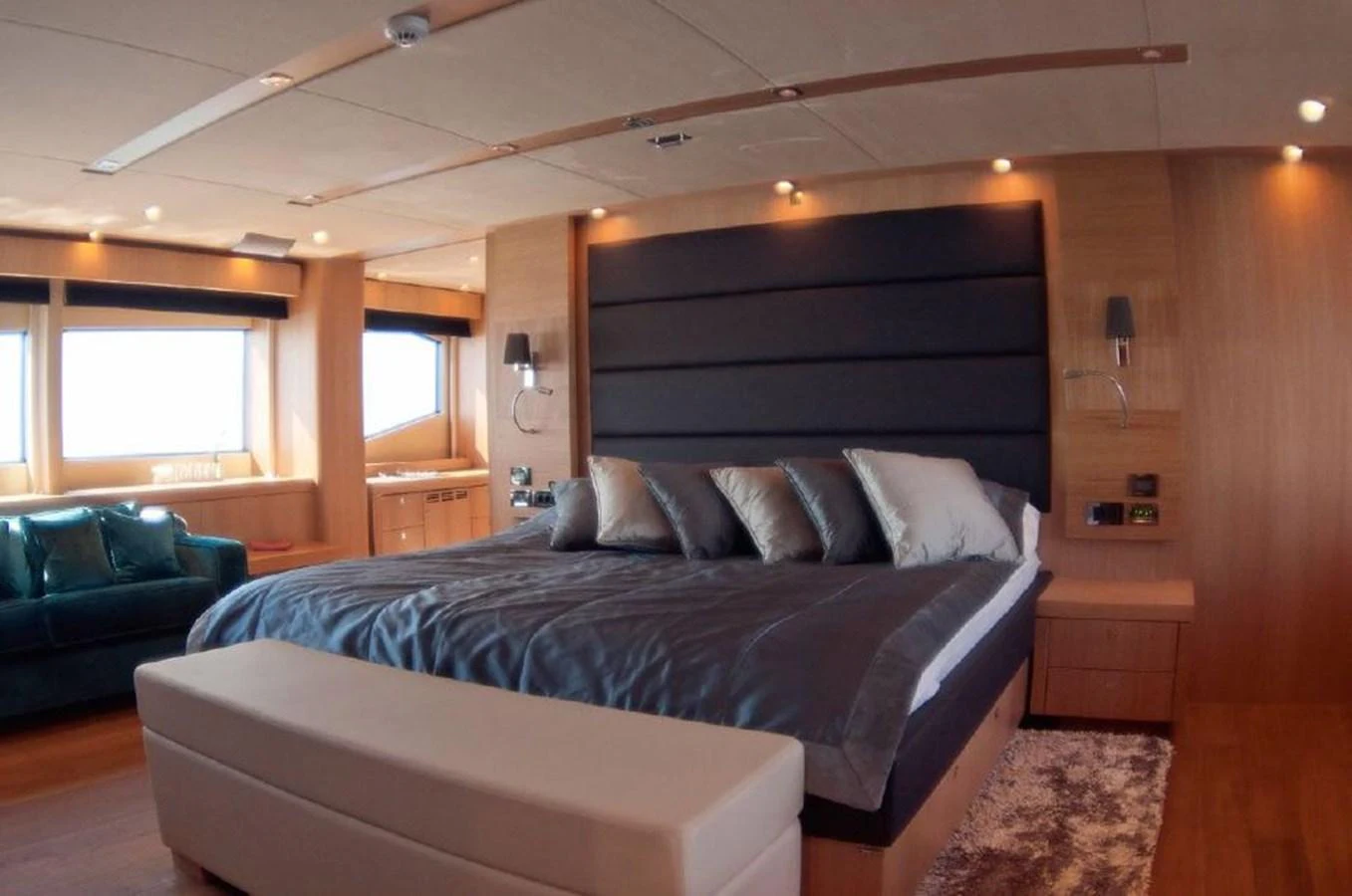 a bed in a room aboard SUN FLOWER Yacht for Sale