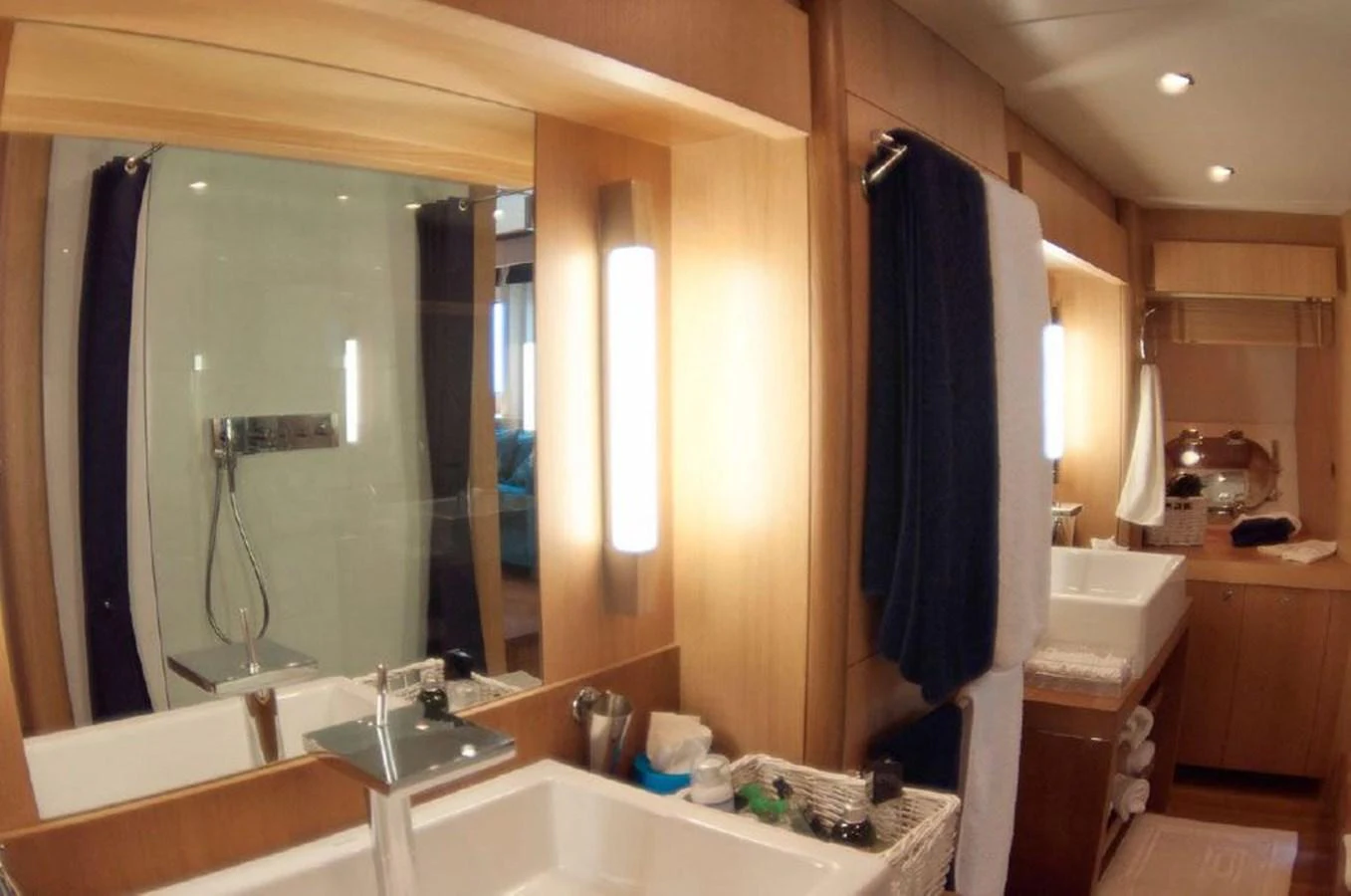 a bathroom with a large mirror aboard SUN FLOWER Yacht for Sale