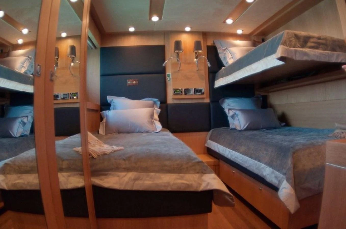 a room with bunk beds aboard SUN FLOWER Yacht for Sale