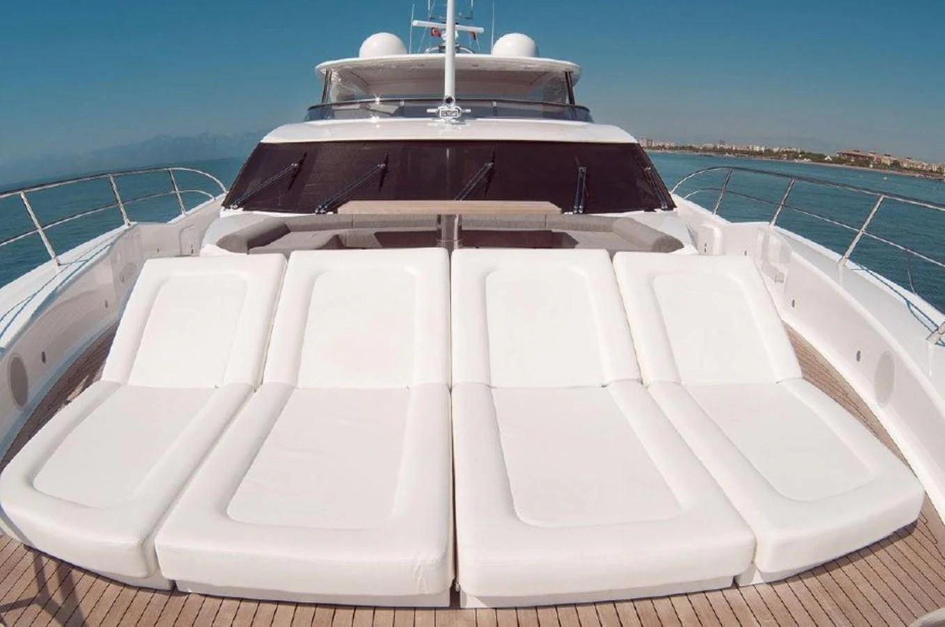 a white boat with a black roof aboard SUN FLOWER Yacht for Sale