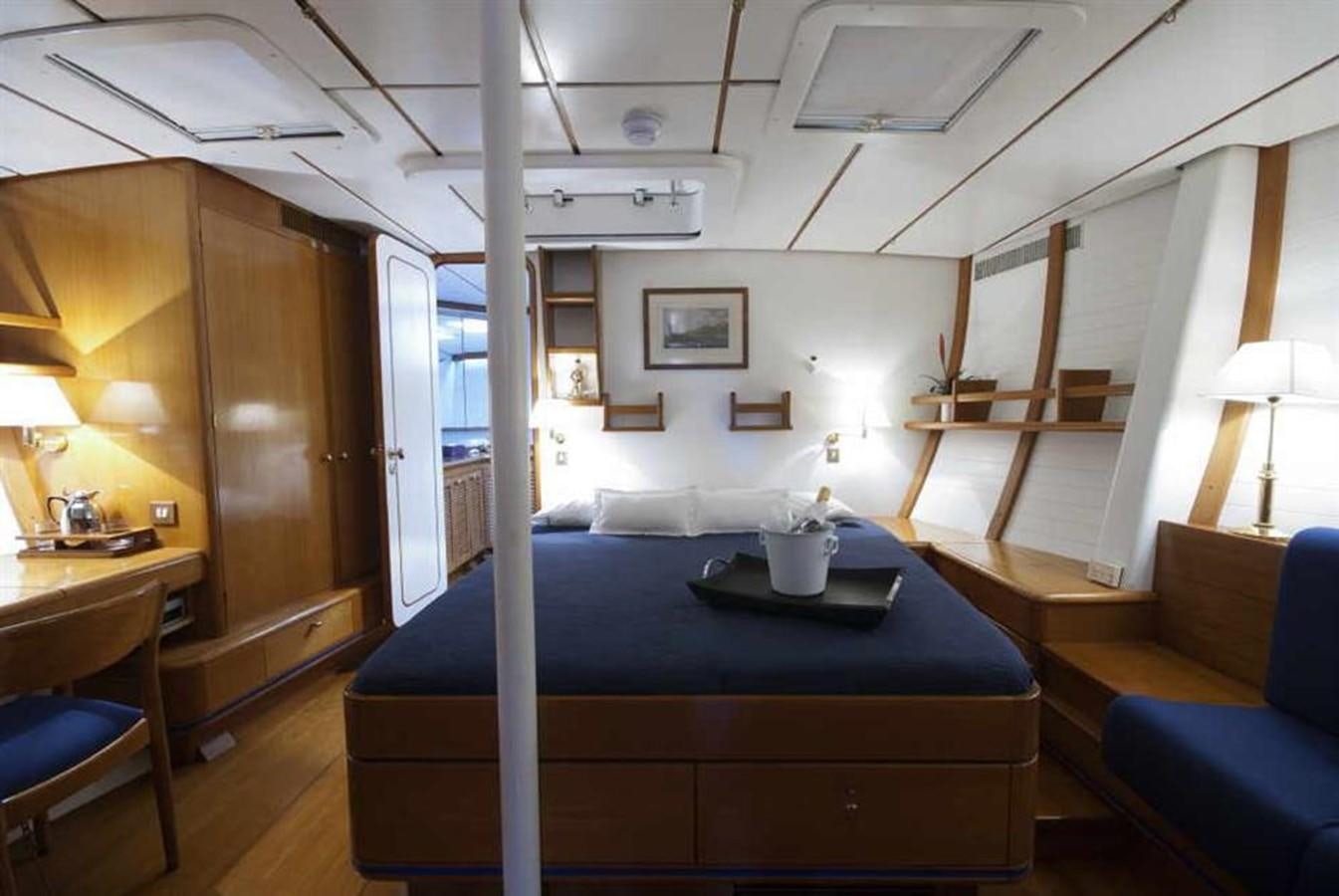 a room with a pool table and a bed aboard BAIURDO VI Yacht for Sale