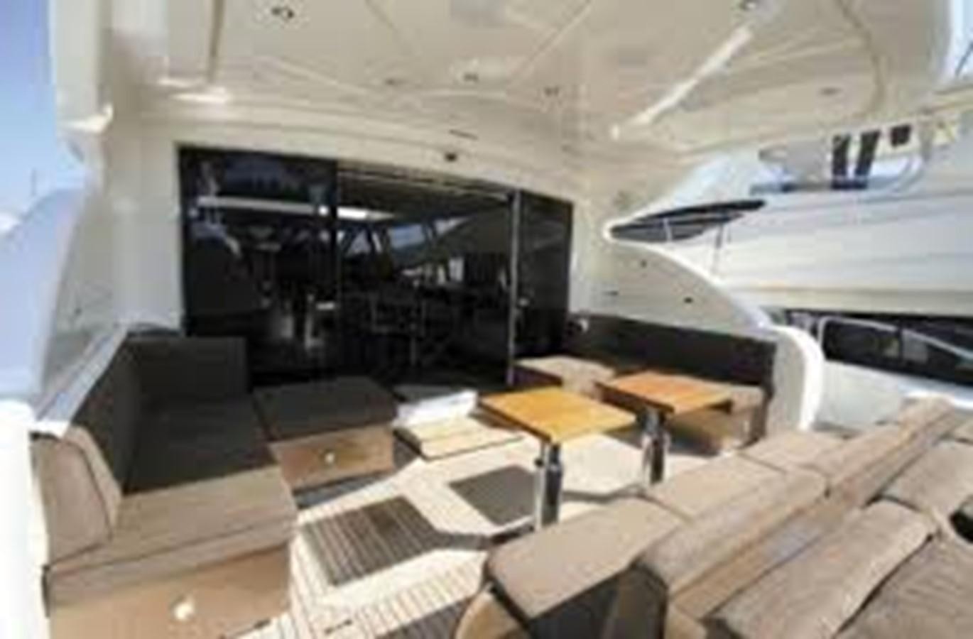 a room with a large black object aboard LEOPARD Yacht for Sale