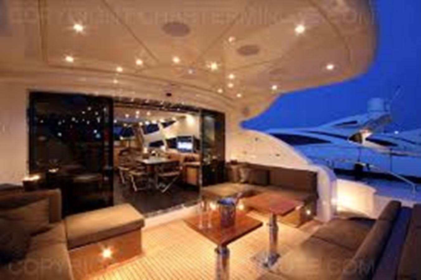 a living room with a large window aboard LEOPARD Yacht for Sale