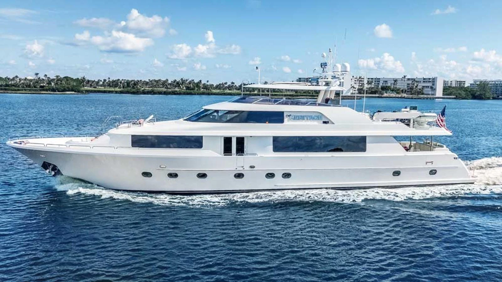a white yacht in the water aboard OUR HERITAGE Yacht for Sale