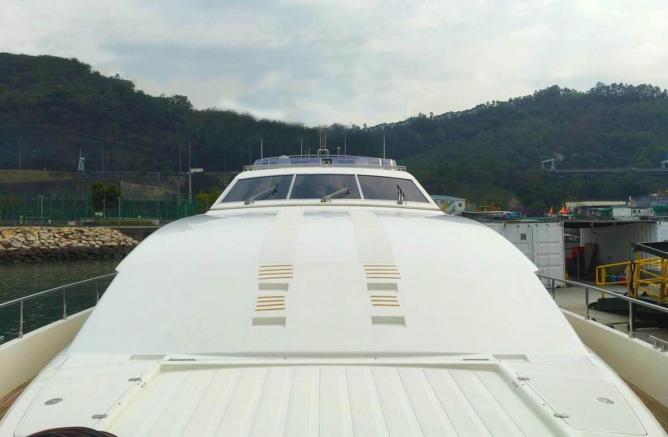 a white boat in a large body of water aboard FERRETTI CUSTOM LINE 112 Yacht for Sale