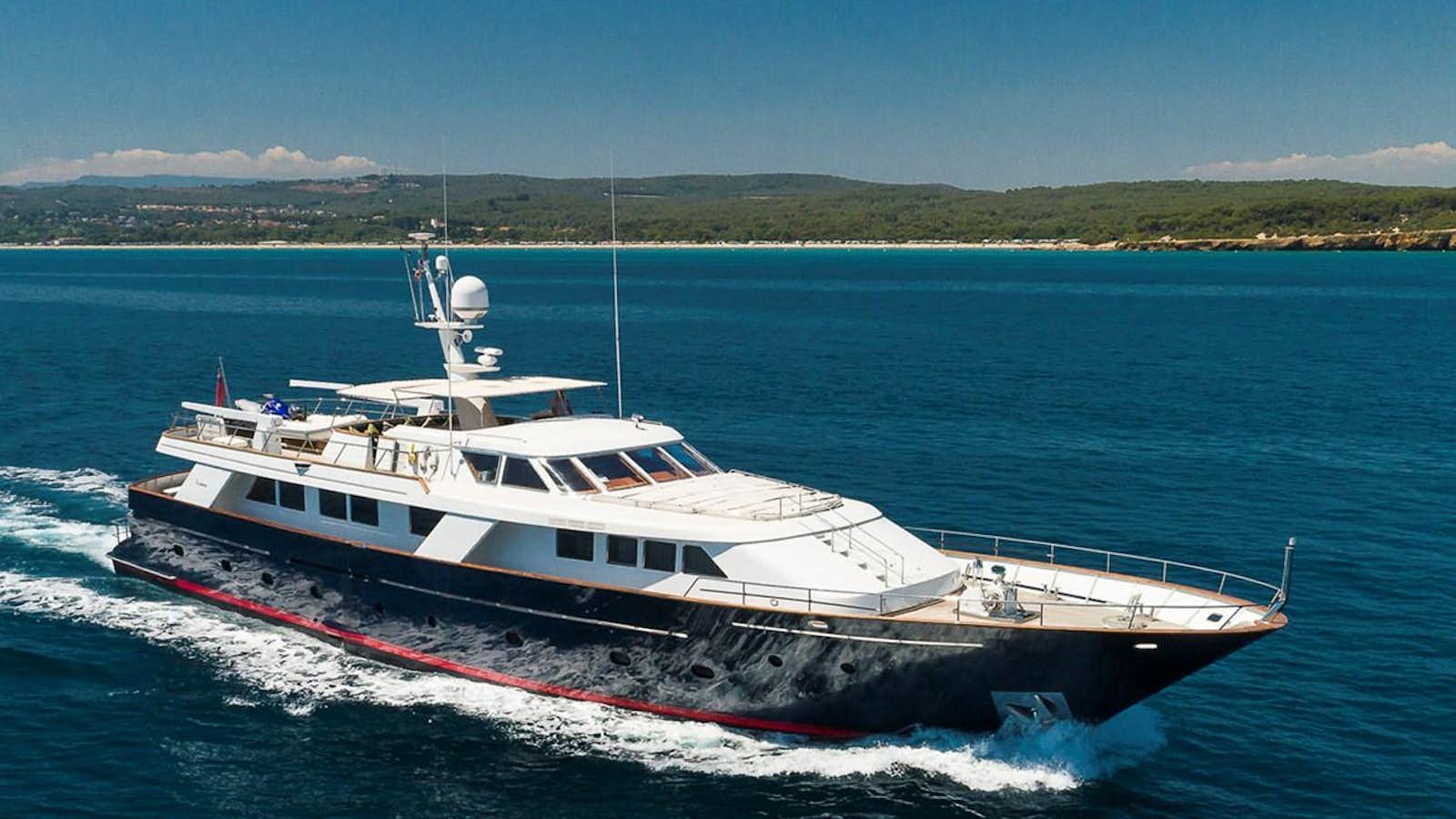 a boat on the water aboard BEL AMI II Yacht for Sale