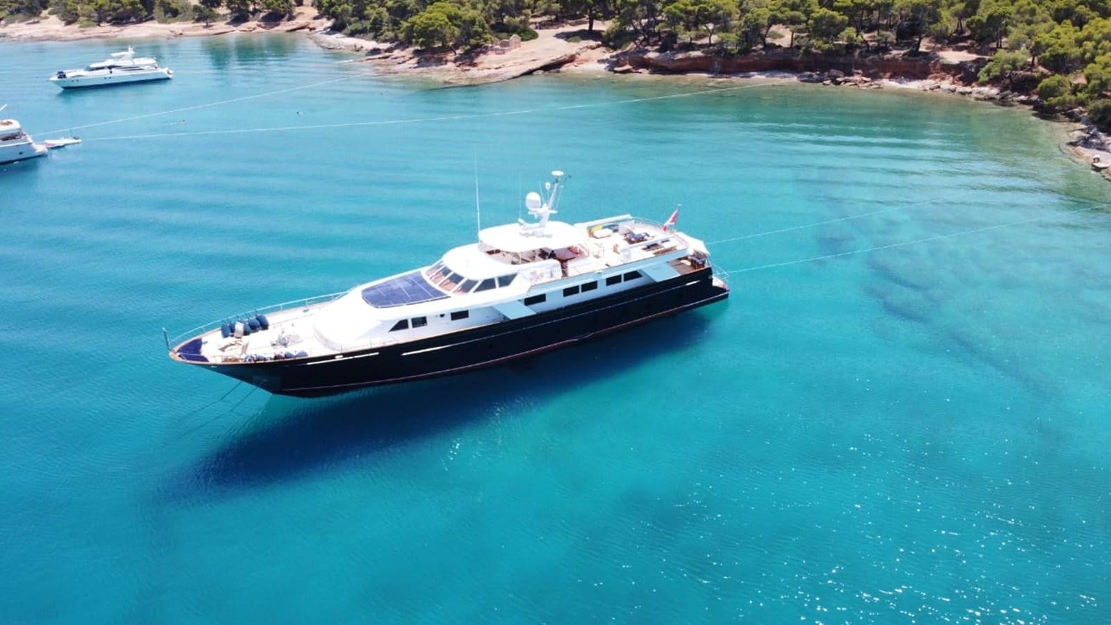 a boat on the water aboard BEL AMI II Yacht for Sale