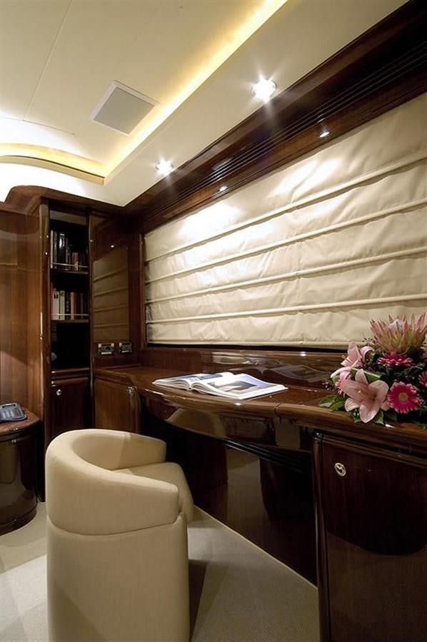 a room with a table and chairs aboard TWO KAY Yacht for Sale