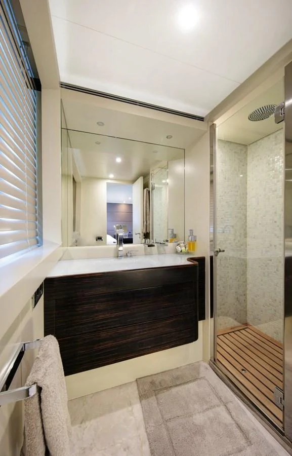 a bathroom with a tub and a sink aboard Y42 Yacht for Charter