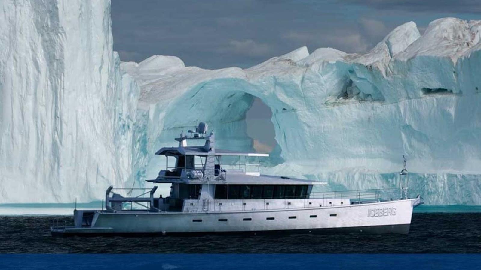 a boat in front of a large waterfall aboard ICEBERG Yacht for Sale