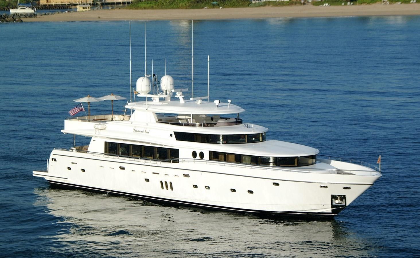 a white boat on the water aboard JOHNSON 110 FLYBRIDGE Yacht for Charter