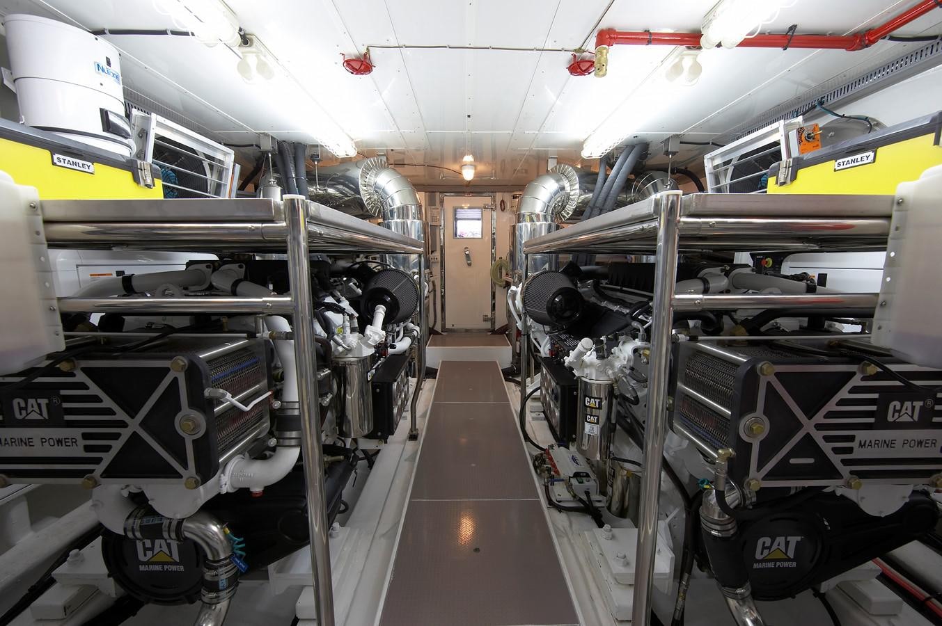 a large room with machinery aboard JOHNSON 110 FLYBRIDGE Yacht for Charter