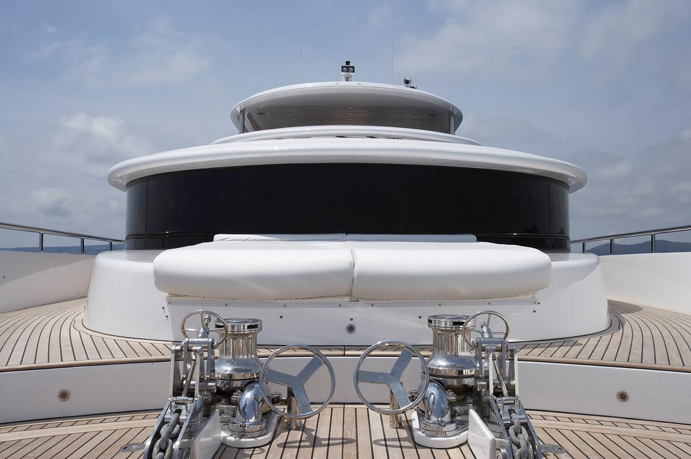 a white bathtub with a large white round top aboard JOHNSON 110 FLYBRIDGE Yacht for Charter