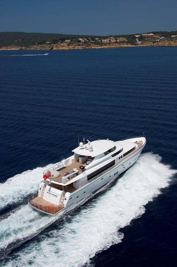 a boat on the water aboard JOHNSON 110 FLYBRIDGE Yacht for Charter
