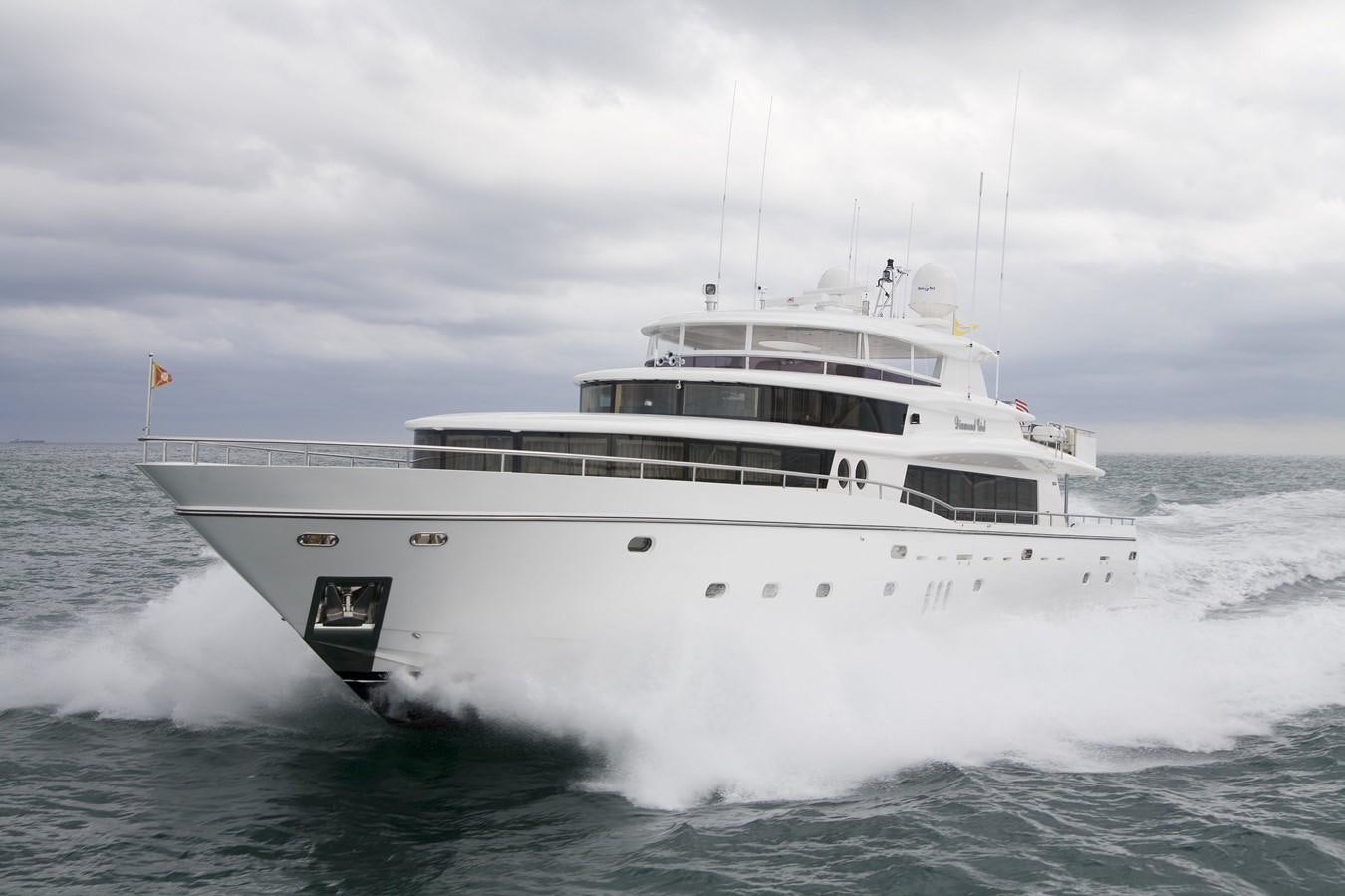 a white boat in the ocean aboard JOHNSON 110 FLYBRIDGE Yacht for Charter