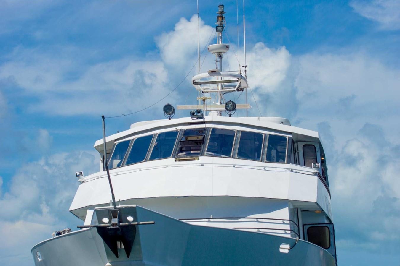 a white boat with a white ship on it aboard LADY TAMARA Yacht for Sale