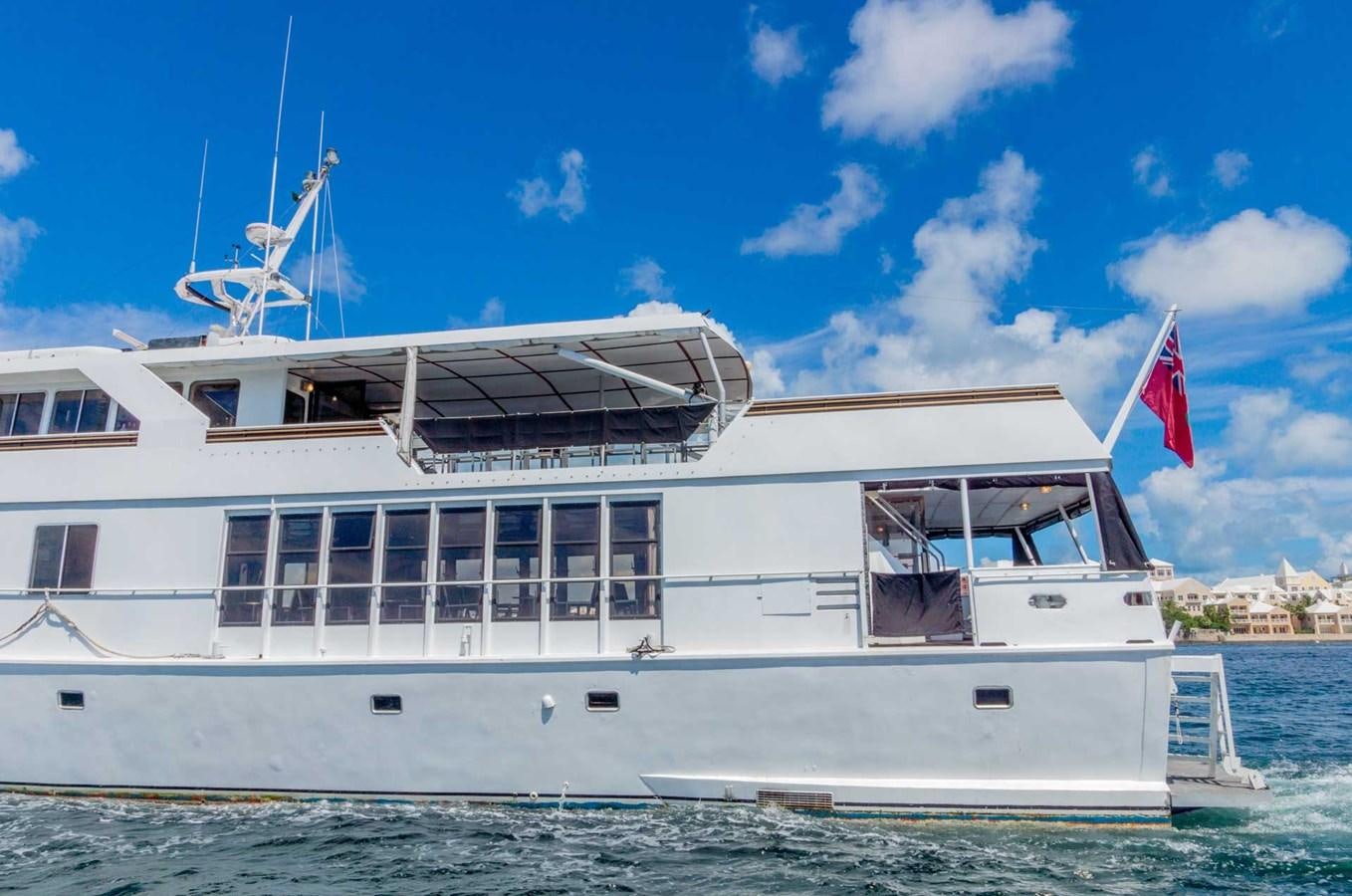a large white boat on the water aboard LADY TAMARA Yacht for Sale