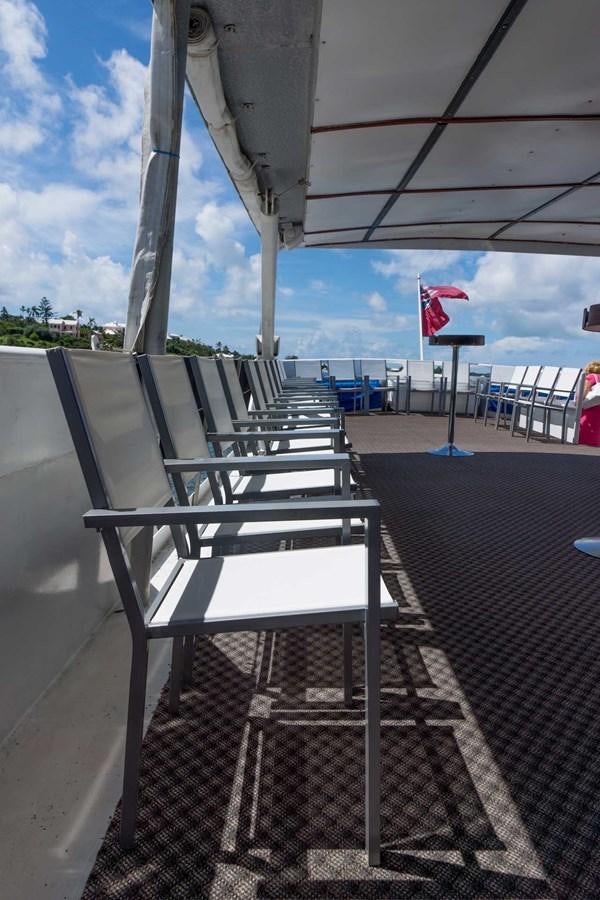a row of benches on a boardwalk aboard LADY TAMARA Yacht for Sale
