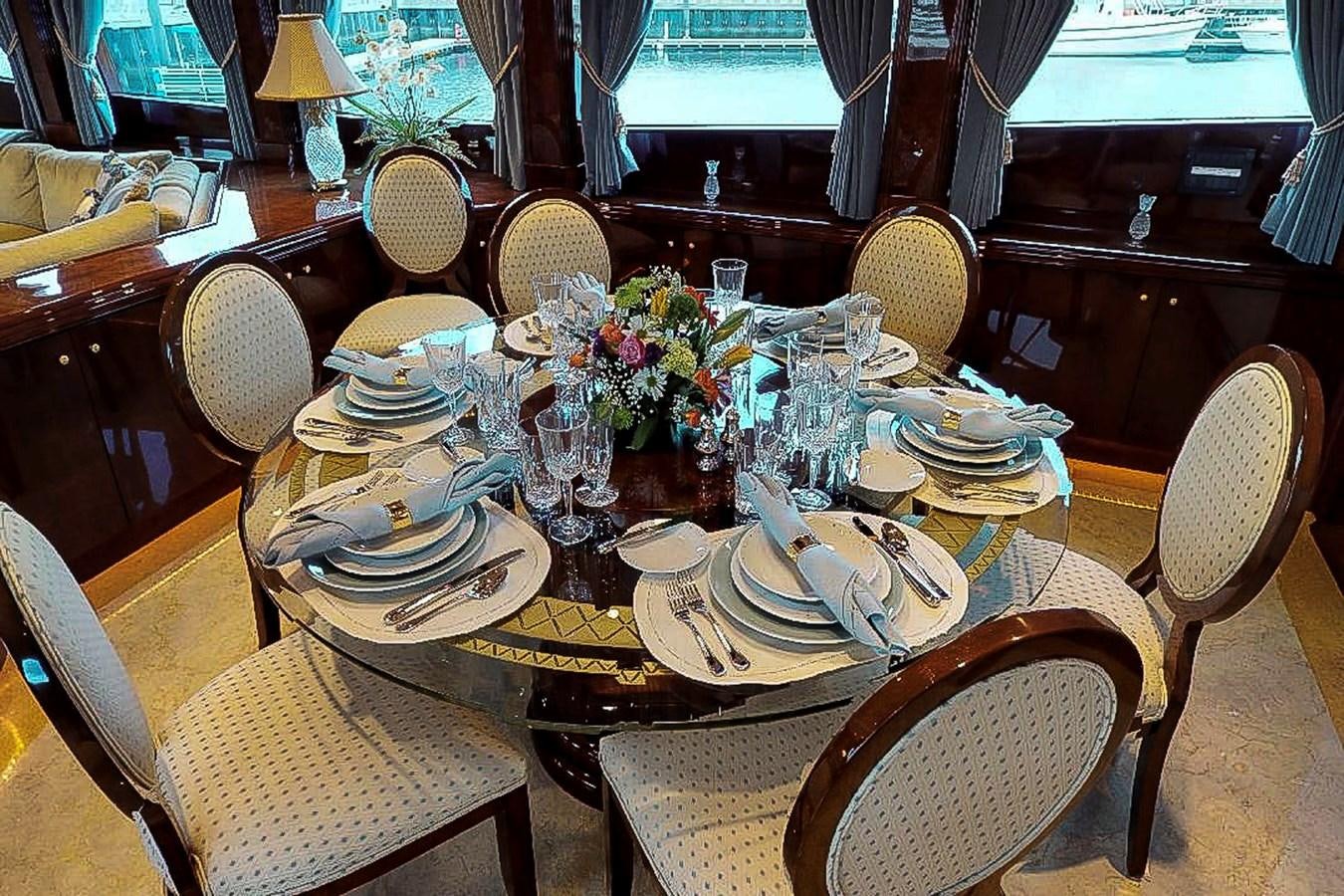a table set for a dinner aboard IDLETYME II Yacht for Sale