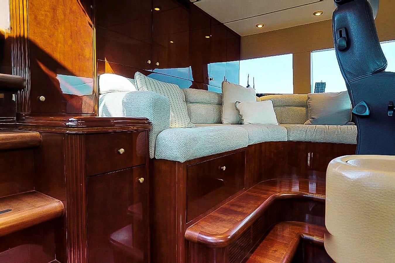 a room with a couch and a table aboard IDLETYME II Yacht for Sale