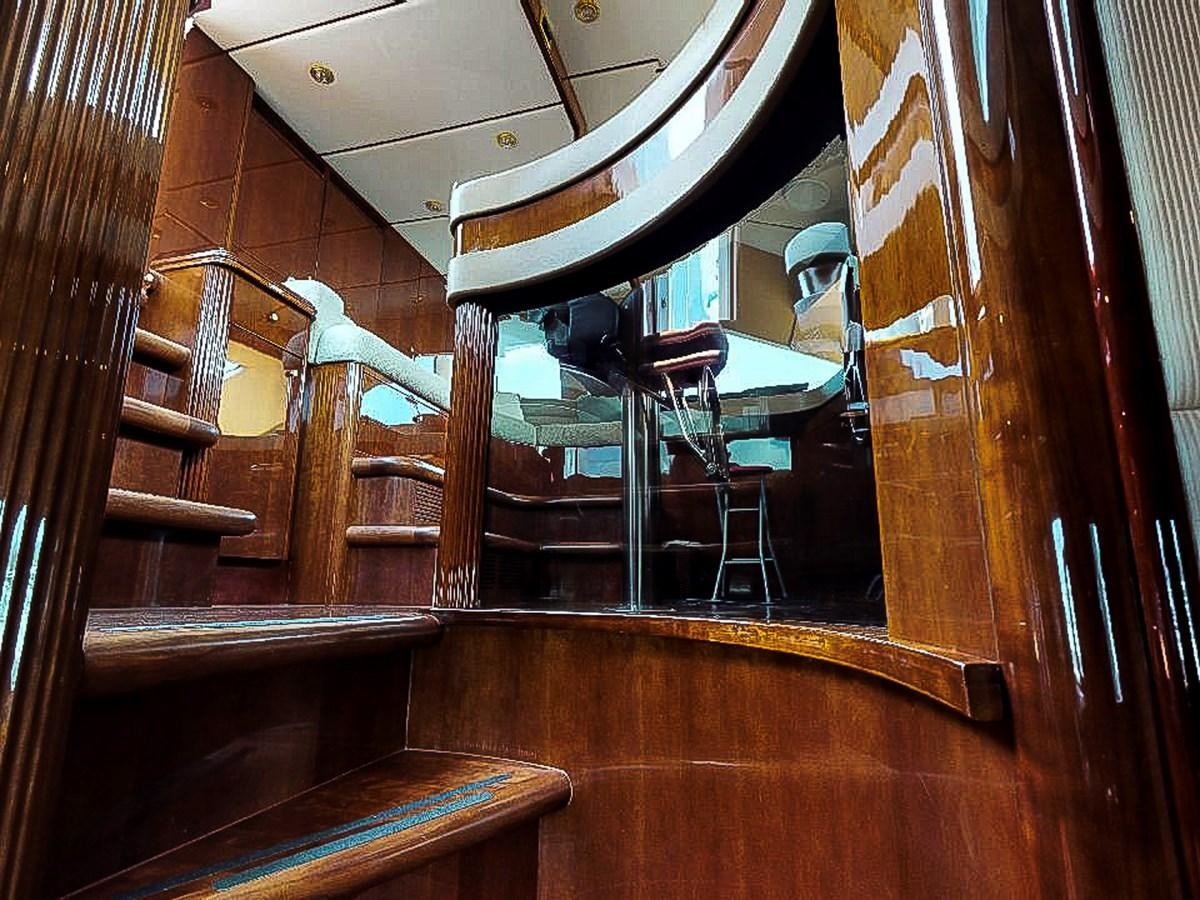 a room with a ceiling fan aboard IDLETYME II Yacht for Sale