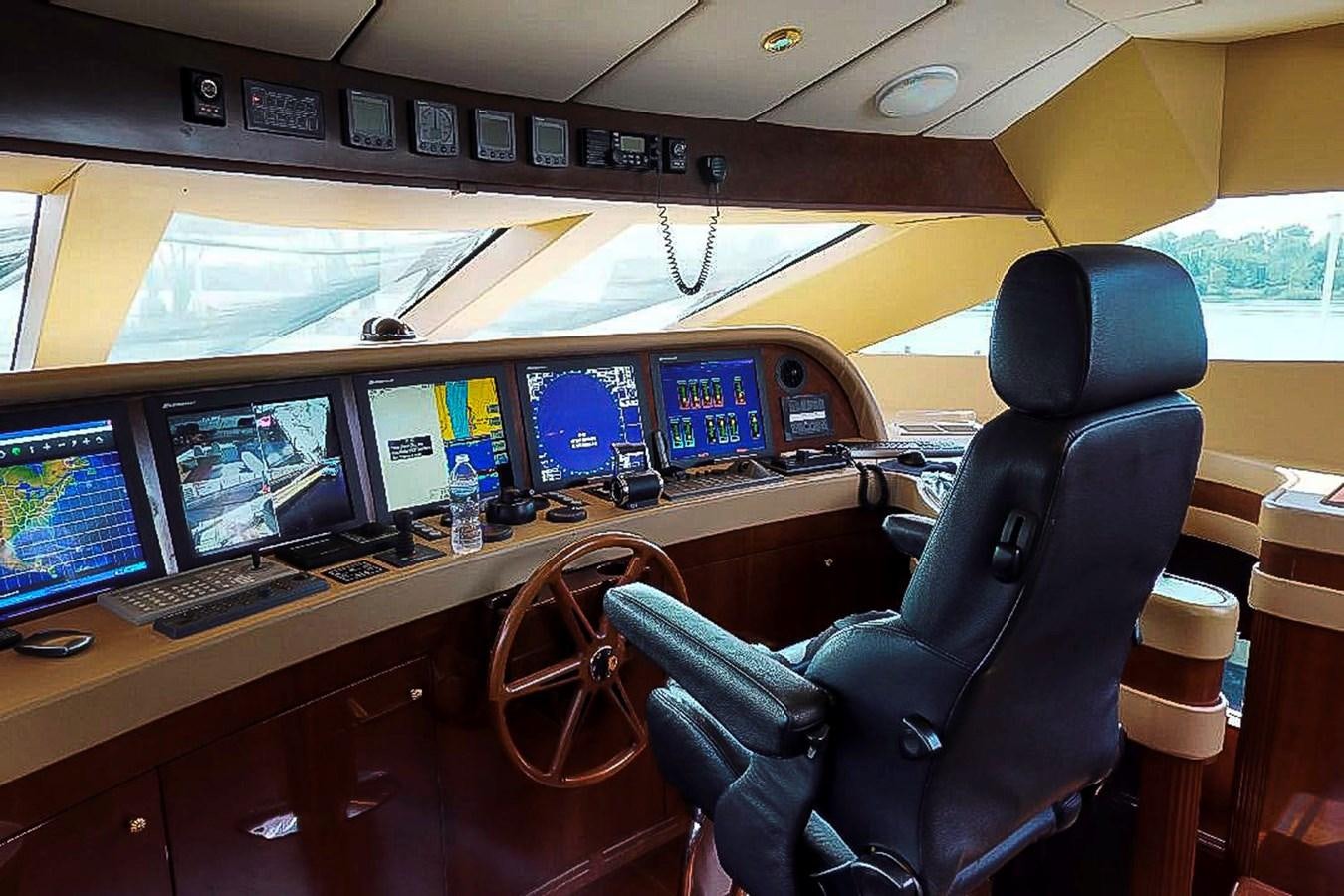 a room with computers and monitors aboard IDLETYME II Yacht for Sale