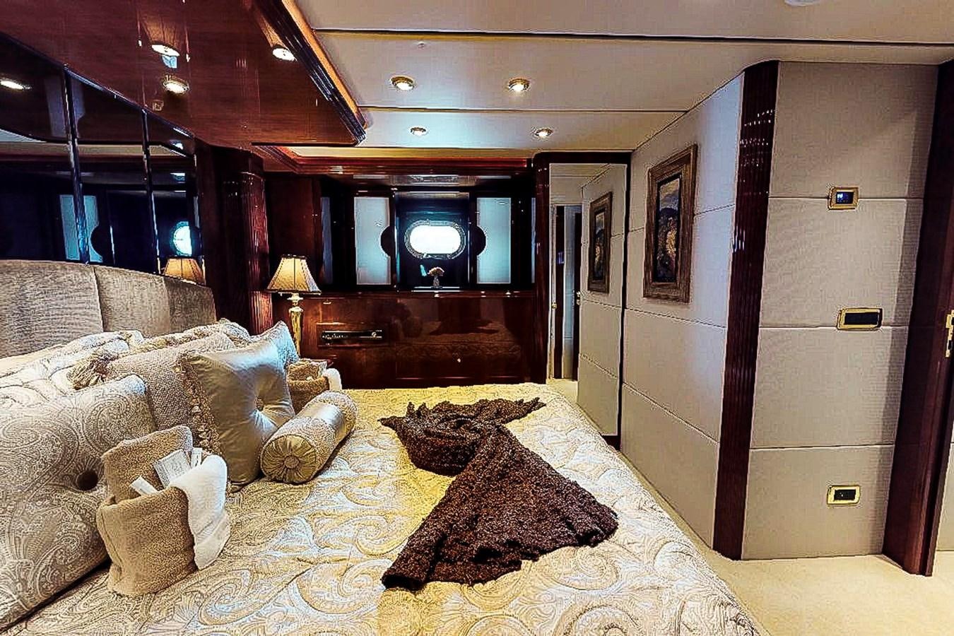 a large bed in a room aboard IDLETYME II Yacht for Sale